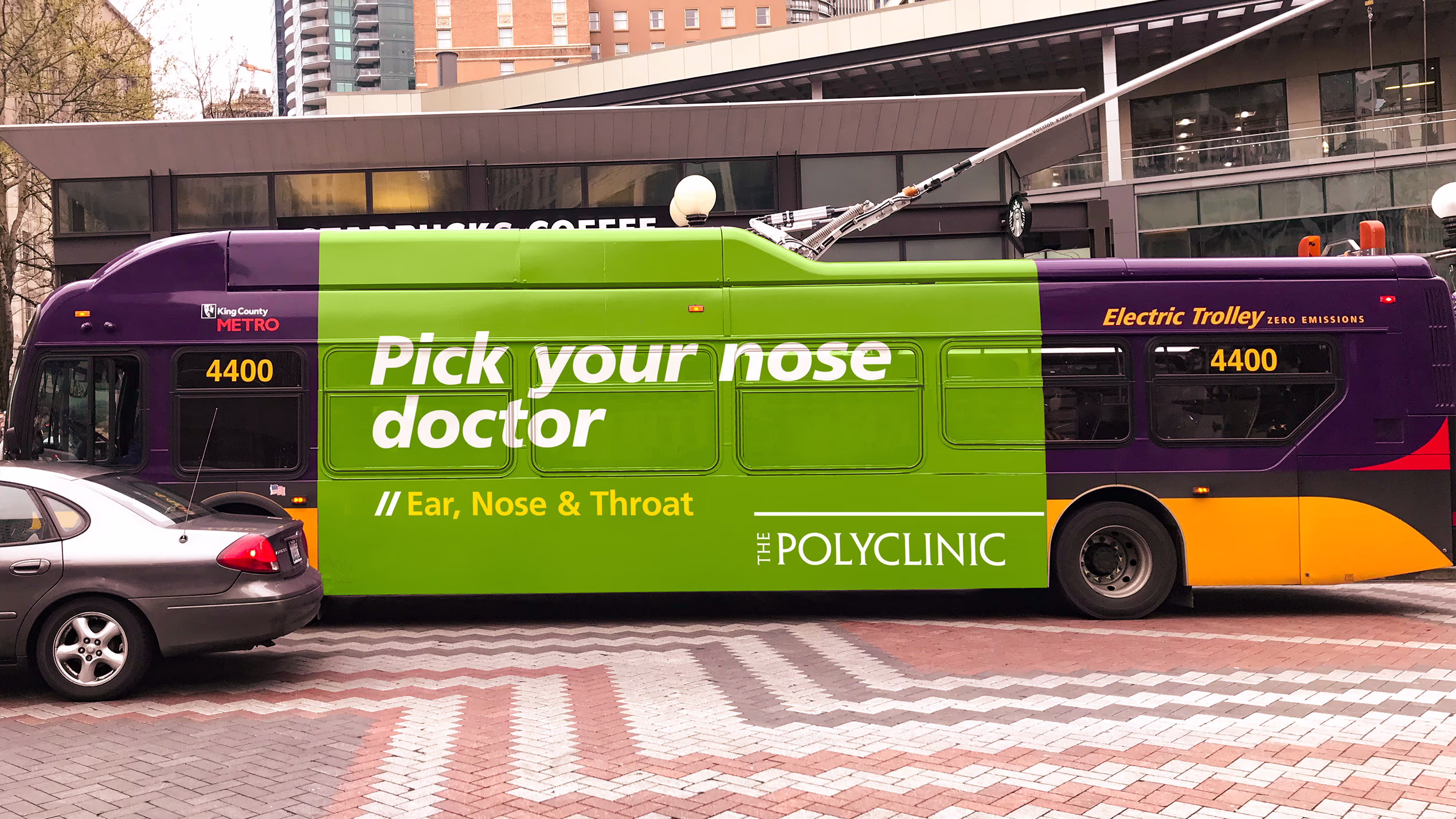 City bus featuring an ad for The Polyclinic. Bold text headline: Pick Your Nose Doctor